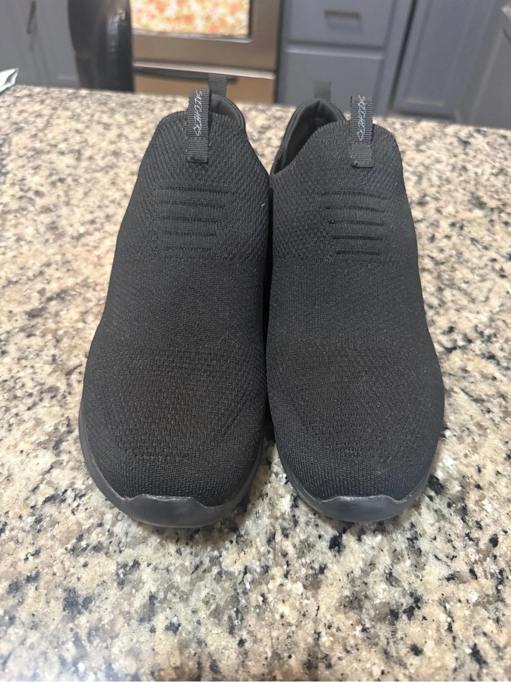 Skechers Men's All-Black Slip-On Knit Sneakers